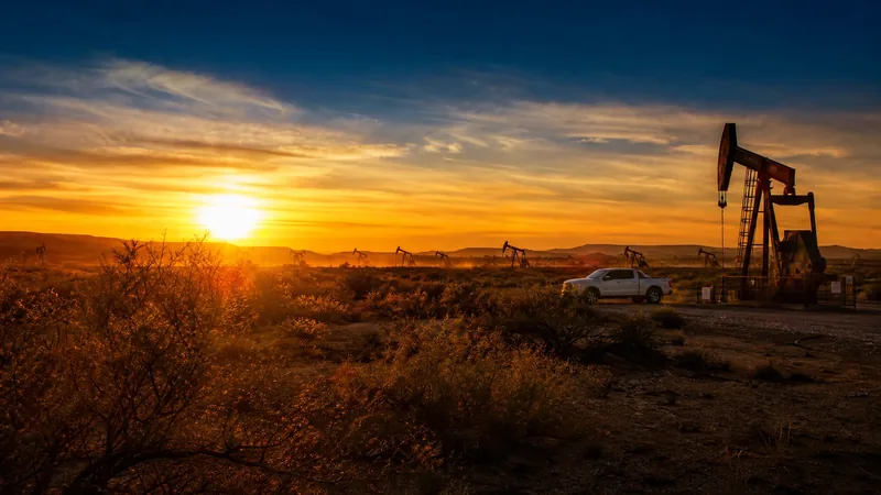 Pumpjacks and a service truck on a West Texas plain at sunrise, how to Start an Oilfield Services Business in Texas